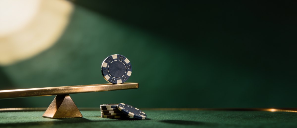 Chip balanced on edge — gambling tilt and bias