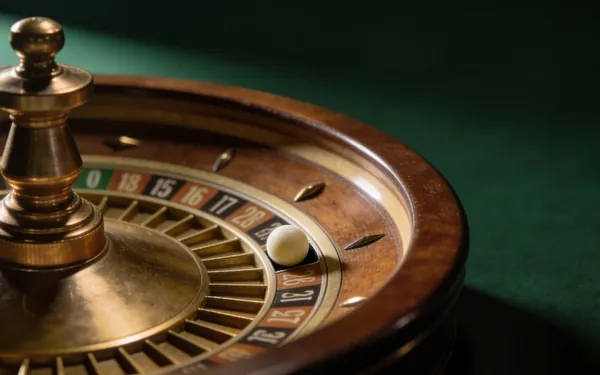 Roulette wheel on a dark green table