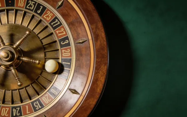 Close view of a roulette wheel and ball